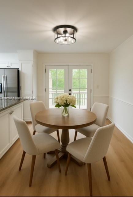 902 Vickie Dr, ,, NC 27511 - dining room with light wood finished floors and french doors