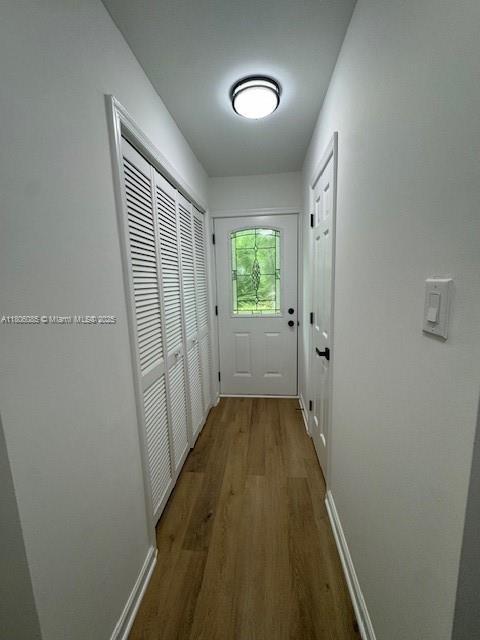902 Vickie Dr, ,, NC 27511 - doorway with wood finished floors and baseboards