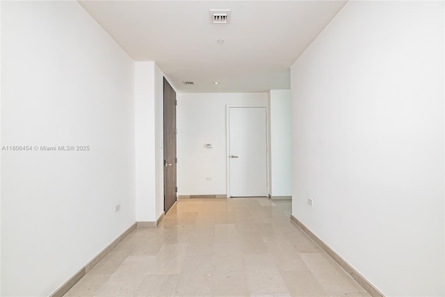 88 SW 7th St Unit 2504, Miami, FL 33130 - hall with baseboards and light flooring