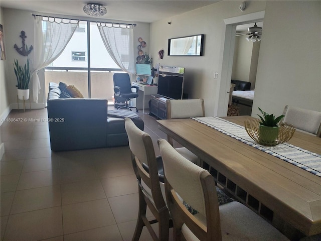 1775 Washington Ave Unit 4A, Miami Beach, FL 33139 - dining area with tile patterned floors and ceiling fan