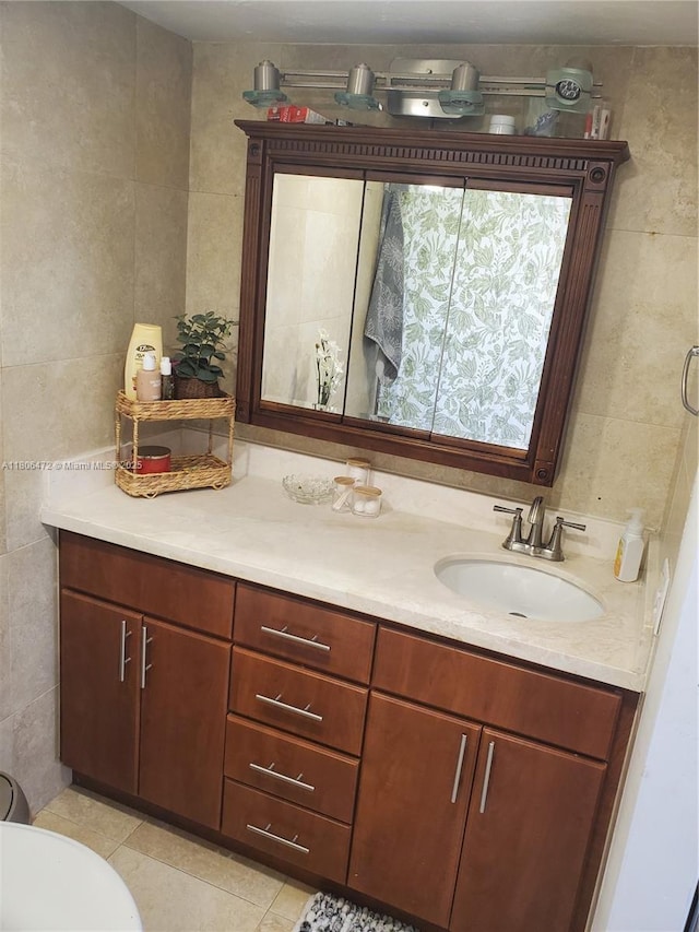 1775 Washington Ave Unit 4A, Miami Beach, FL 33139 - bathroom with tile walls, vanity, toilet, and tile patterned floors