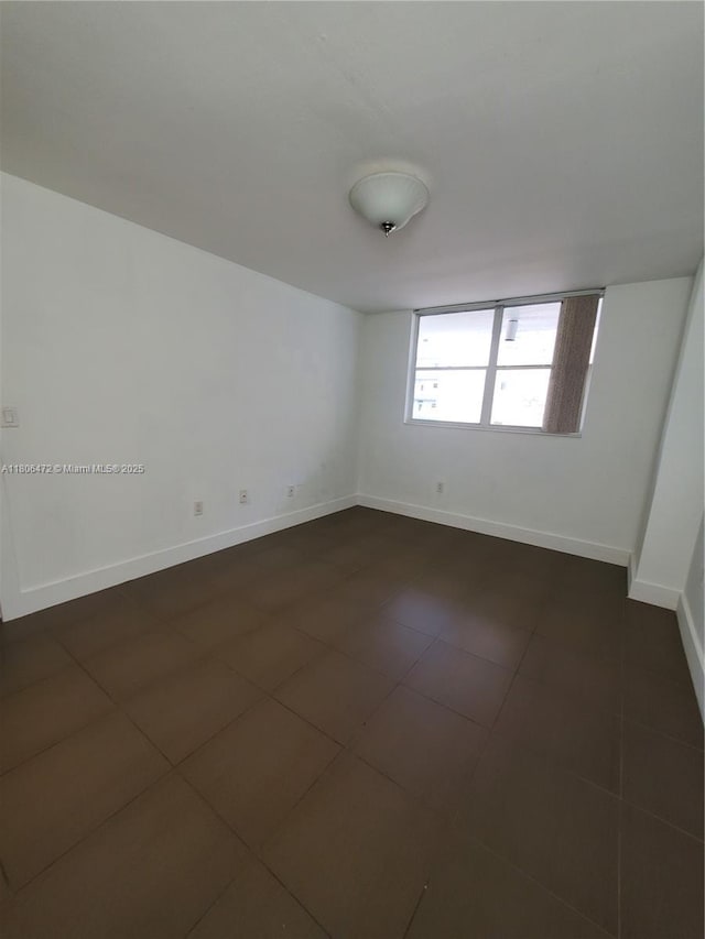 1775 Washington Ave Unit 4A, Miami Beach, FL 33139 - unfurnished room featuring baseboards