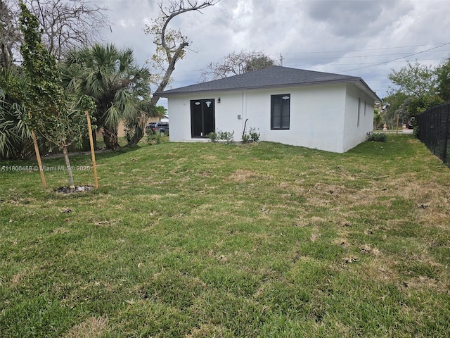 714 NW 4th Ave, Pompano Beach, FL 33060 - back of property featuring stucco siding and roof with shingles