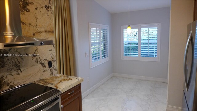 14430 SW 108th St, Miami, FL 33186 - kitchen with electric stove, freestanding refrigerator, range hood, and healthy amount of natural light