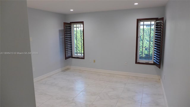 14430 SW 108th St, Miami, FL 33186 - spare room featuring recessed lighting, baseboards, and marble finish flooring