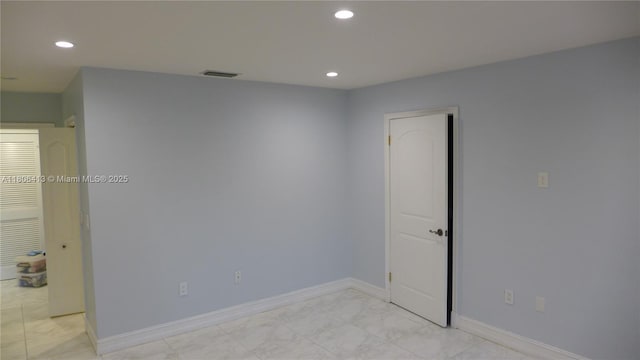 14430 SW 108th St, Miami, FL 33186 - empty room featuring light marble finish flooring, recessed lighting, and baseboards