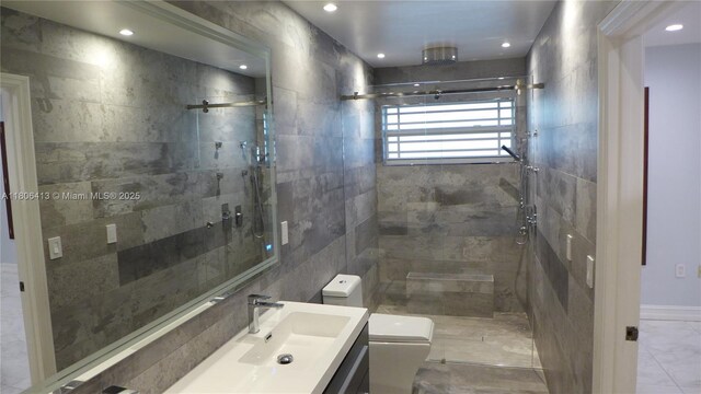 14430 SW 108th St, Miami, FL 33186 - full bathroom with a shower stall, vanity, toilet, marble finish floors, and recessed lighting