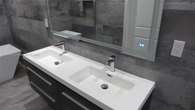 14430 SW 108th St, Miami, FL 33186 - bathroom with tile walls, decorative backsplash, and double vanity