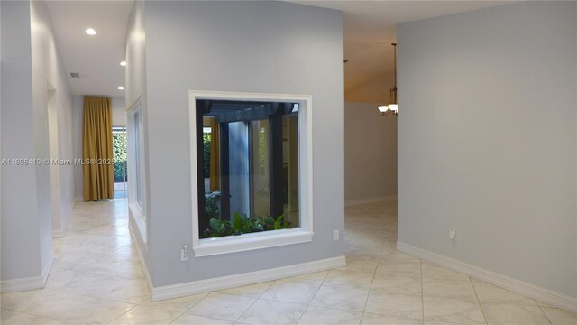 14430 SW 108th St, Miami, FL 33186 - empty room featuring baseboards, a chandelier, and recessed lighting