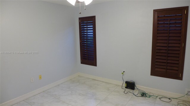 14430 SW 108th St, Miami, FL 33186 - unfurnished room with ceiling fan and baseboards