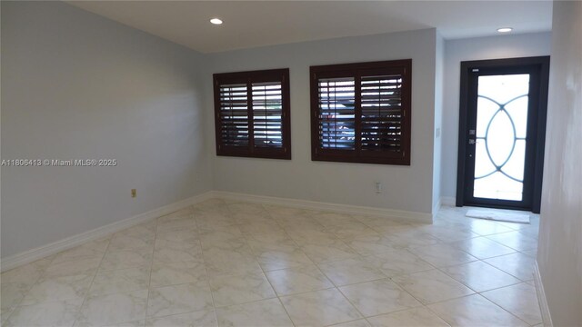 14430 SW 108th St, Miami, FL 33186 - foyer entrance featuring plenty of natural light, baseboards, and recessed lighting