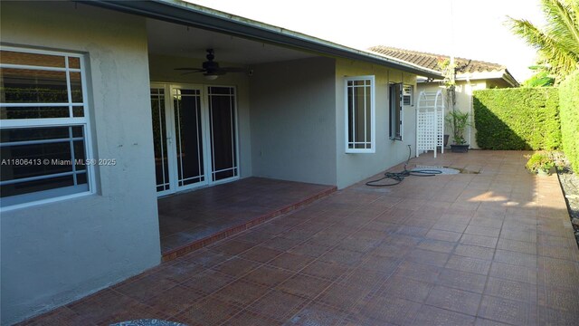 14430 SW 108th St, Miami, FL 33186 - view of patio featuring a ceiling fan
