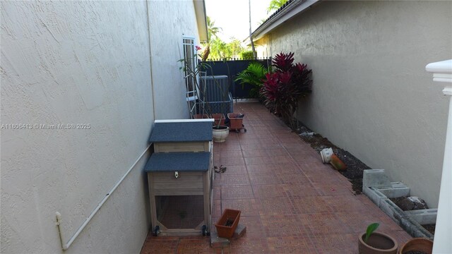 14430 SW 108th St, Miami, FL 33186 - view of patio / terrace featuring cooling unit