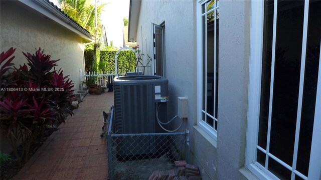 14430 SW 108th St, Miami, FL 33186 - exterior view of stucco siding and central AC