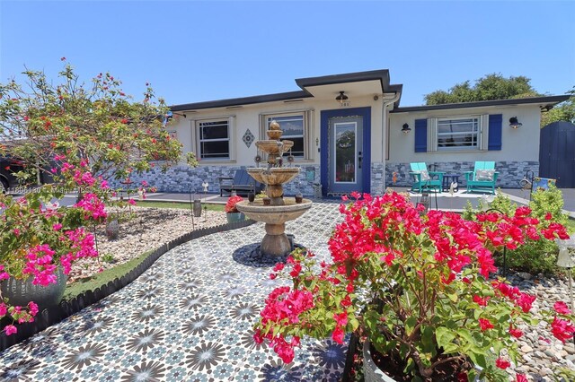 101 NE 9th Ave, Hialeah, FL 33010 - ranch-style home featuring stucco siding and stone siding