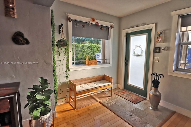 101 NE 9th Ave, Hialeah, FL 33010 - entrance foyer with wood finished floors and baseboards