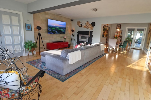 101 NE 9th Ave, Hialeah, FL 33010 - living room featuring wood finished floors