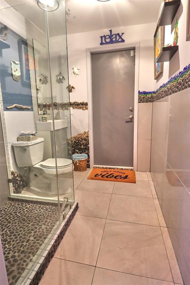 101 NE 9th Ave, Hialeah, FL 33010 - full bath with a stall shower, tile patterned flooring, and toilet