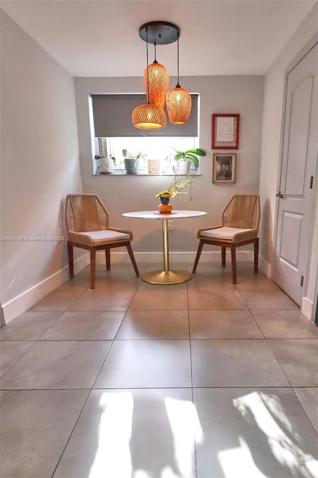 101 NE 9th Ave, Hialeah, FL 33010 - sitting room featuring baseboards and tile patterned floors