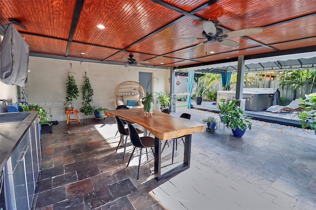101 NE 9th Ave, Hialeah, FL 33010 - view of patio with a hot tub, outdoor dining area, and ceiling fan