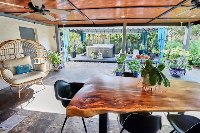 101 NE 9th Ave, Hialeah, FL 33010 - view of patio featuring a hot tub, a ceiling fan, outdoor dining area, and a pergola