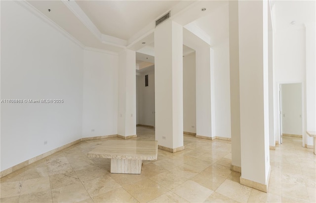808 Brickell Key Dr Unit 404, Miami, FL 33131 - spare room featuring baseboards and crown molding