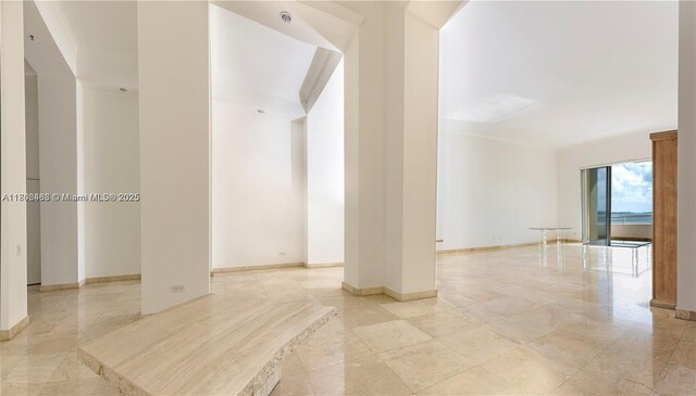 808 Brickell Key Dr Unit 404, Miami, FL 33131 - spare room with baseboards