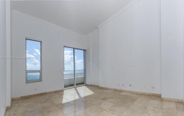 808 Brickell Key Dr Unit 404, Miami, FL 33131 - unfurnished room with ornamental molding and baseboards