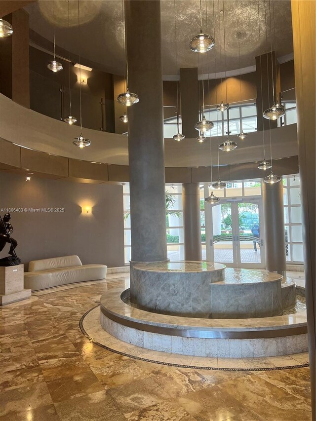 808 Brickell Key Dr Unit 404, Miami, FL 33131 - lobby featuring a towering ceiling