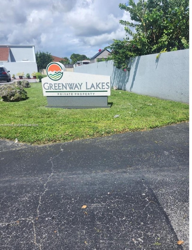 2110 SW 122nd Ct Unit 2110, Miami, FL 33175 - community / neighborhood sign with a yard
