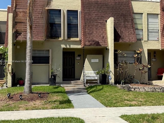 8992 Palm Tree Ln Unit 8992, Pembroke Pines, FL 33024 - view of property with stucco siding
