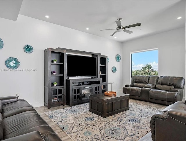 332 Balboa St, Hollywood, FL 33019 - living area featuring a ceiling fan, light wood finished floors, baseboards, and recessed lighting