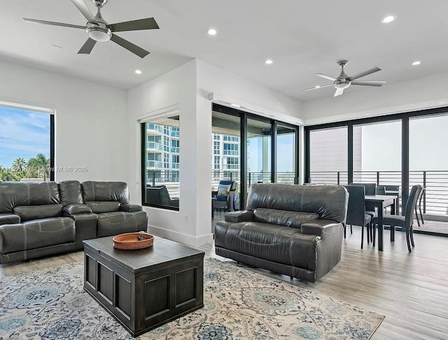 332 Balboa St, Hollywood, FL 33019 - living area featuring ceiling fan, healthy amount of natural light, light wood-style flooring, recessed lighting, and baseboards
