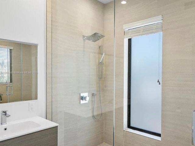 332 Balboa St, Hollywood, FL 33019 - bathroom featuring a tile shower and vanity