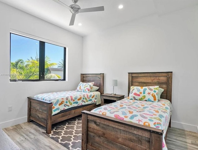 332 Balboa St, Hollywood, FL 33019 - bedroom featuring wood finished floors, baseboards, recessed lighting, and a ceiling fan