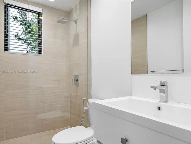 332 Balboa St, Hollywood, FL 33019 - full bathroom featuring a shower stall, toilet, and a sink