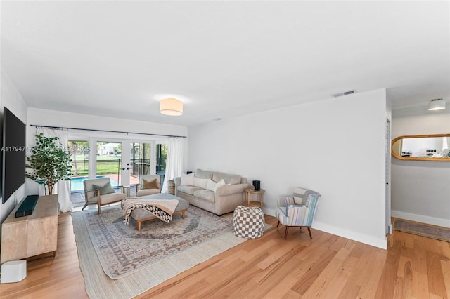 8885 SW 182nd Ter, Palmetto Bay, FL 33157 - living room with wood finished floors and baseboards