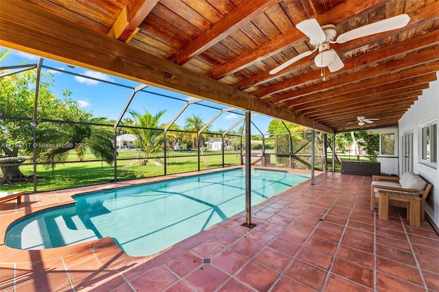 8885 SW 182nd Ter, Palmetto Bay, FL 33157 - outdoor pool with ceiling fan, a patio area, a lanai, and a yard
