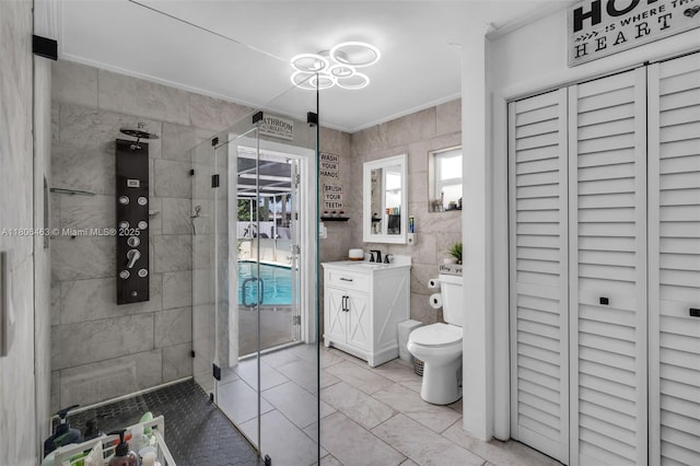 7311 Biltmore Blvd, Miramar, FL 33023 - full bathroom with a shower stall, vanity, toilet, marble finish floors, and crown molding
