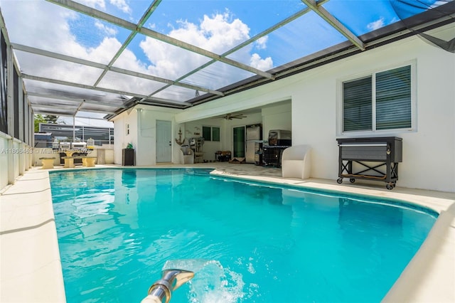7311 Biltmore Blvd, Miramar, FL 33023 - view of swimming pool with ceiling fan, a patio, and glass enclosure