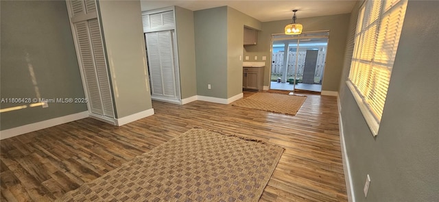 331 N 70th Way, Hollywood, FL 33024 - foyer with baseboards and wood finished floors