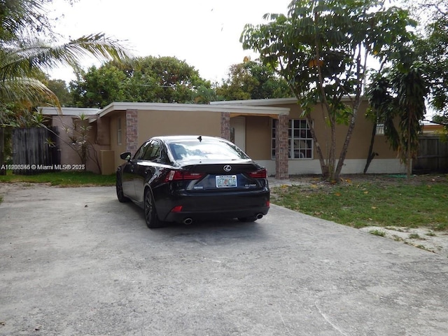 2507 N 66th Ave, Hollywood, FL 33024 - view of front of home featuring stone siding and stucco siding