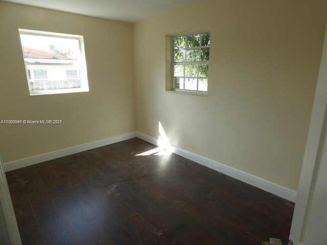 2507 N 66th Ave, Hollywood, FL 33024 - unfurnished room with dark wood-style flooring and baseboards