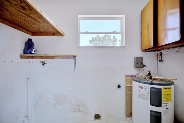 210 Joe Hilton St, Avon Park, FL 33825 - interior space featuring electric water heater and electric dryer hookup