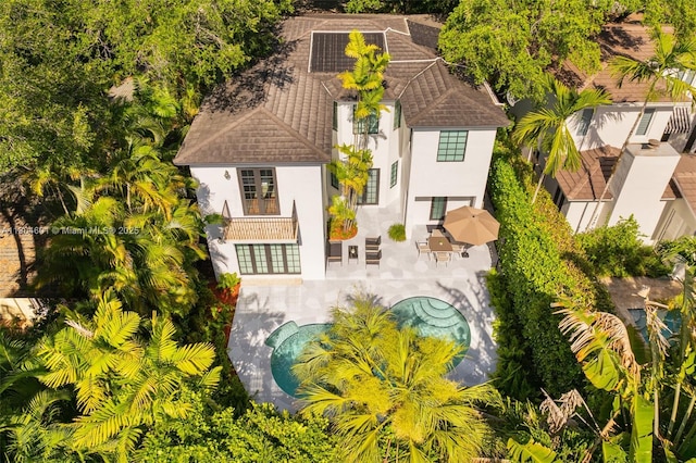 view from above of property with a pool area