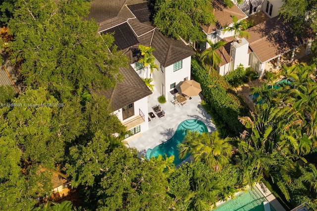 drone / aerial view of a pool area