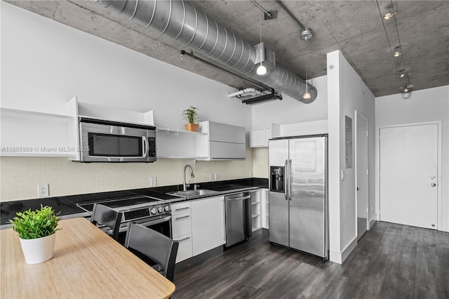 690 SW 1st Ct Unit 2717, Miami, FL 33130 - kitchen with stainless steel appliances, open shelves, a sink, dark countertops, and a high ceiling