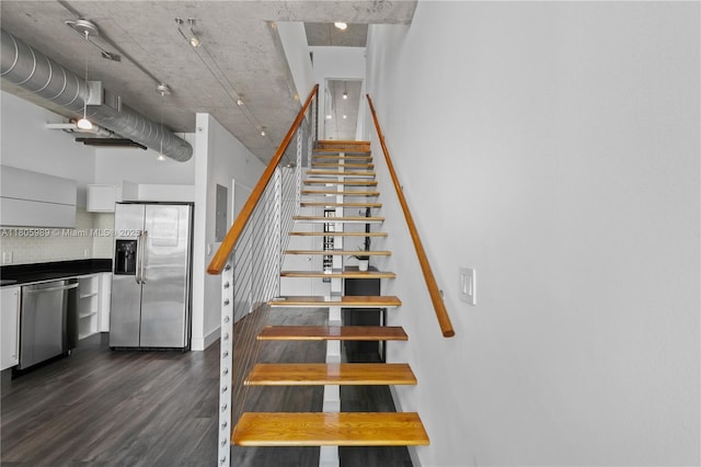 690 SW 1st Ct Unit 2717, Miami, FL 33130 - staircase with wood finished floors and a towering ceiling