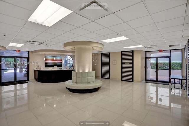 1621 Collins Ave Unit 505, Miami Beach, FL 33139 - reception area featuring french doors and a paneled ceiling