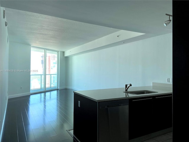 1900 N Bayshore Dr Unit 4708, Miami, FL 33132 - kitchen featuring dishwasher, open floor plan, light countertops, dark cabinetry, and a textured ceiling